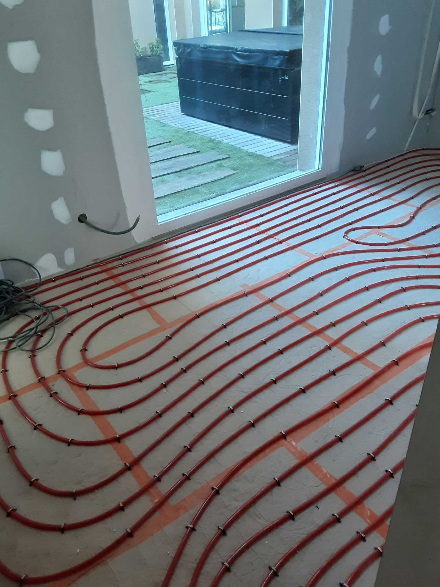 Plancher chauffant en cours de pose par Celsius